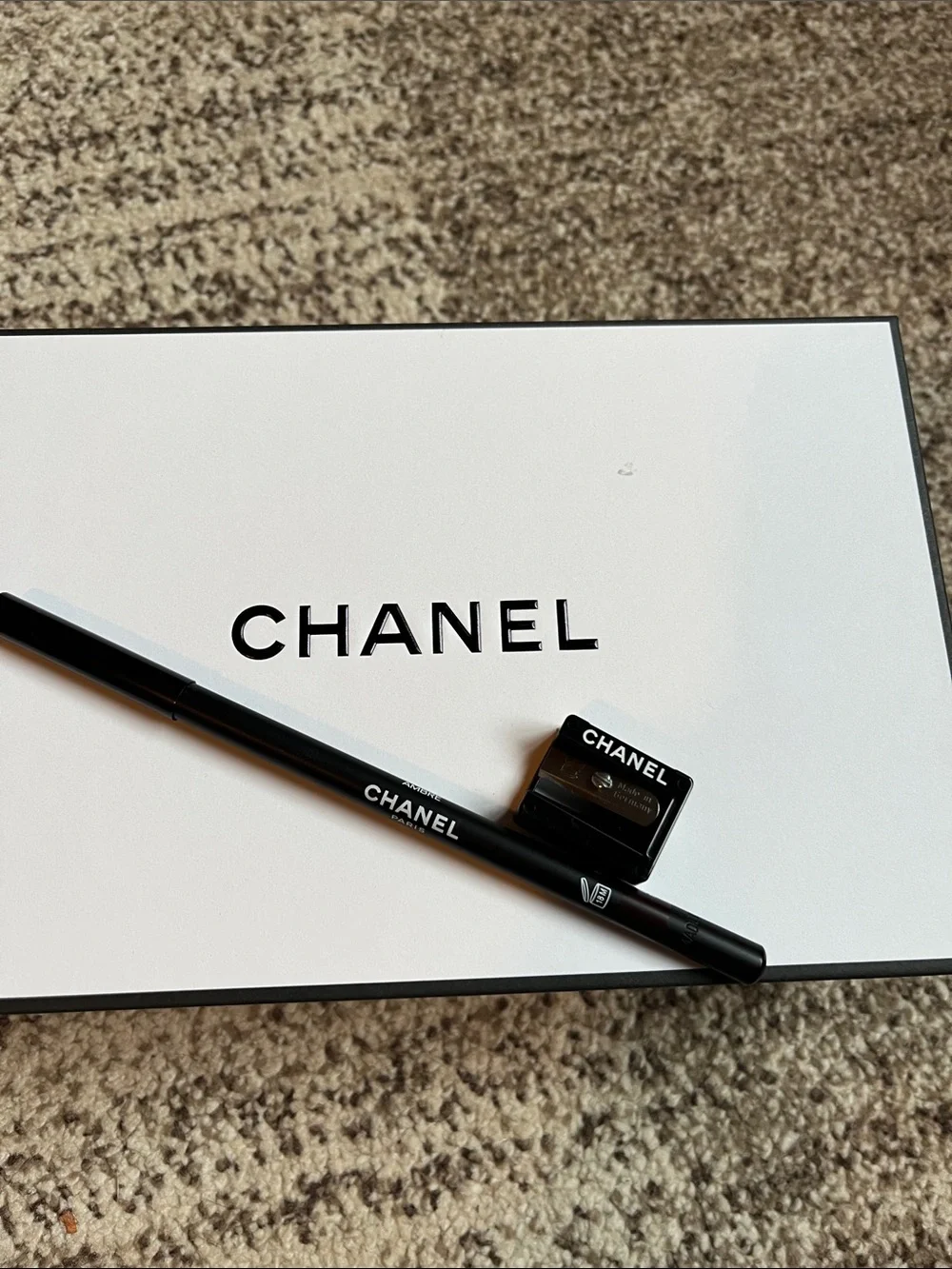 Chanel Pencil and Sharpener, brown color.